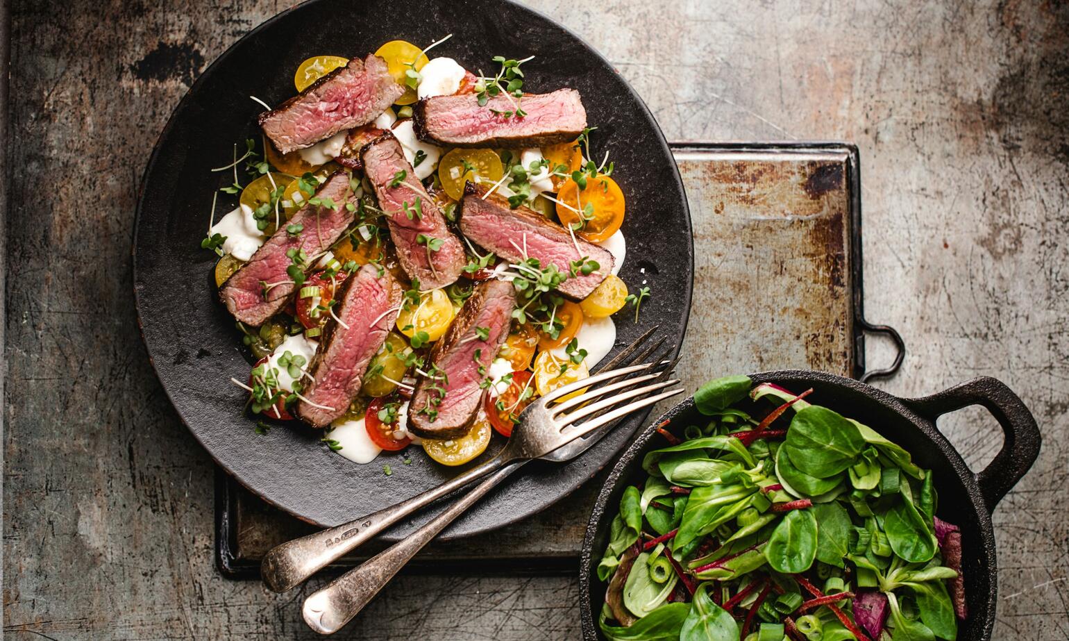 cooked steak and salad side