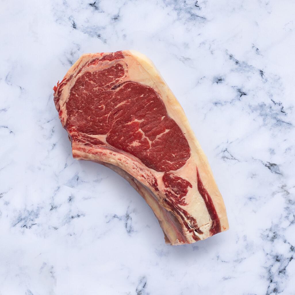 sirloin chop on marble background