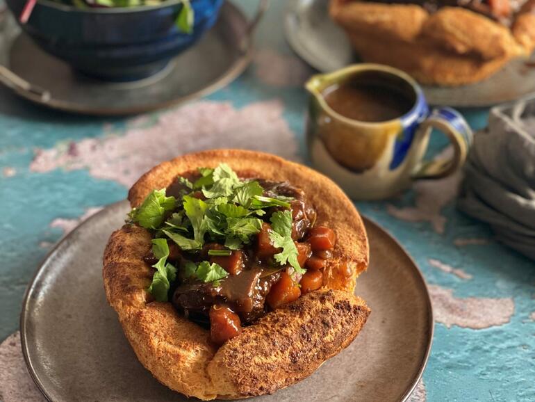 cooked ox cheeks on yorkshire puddings