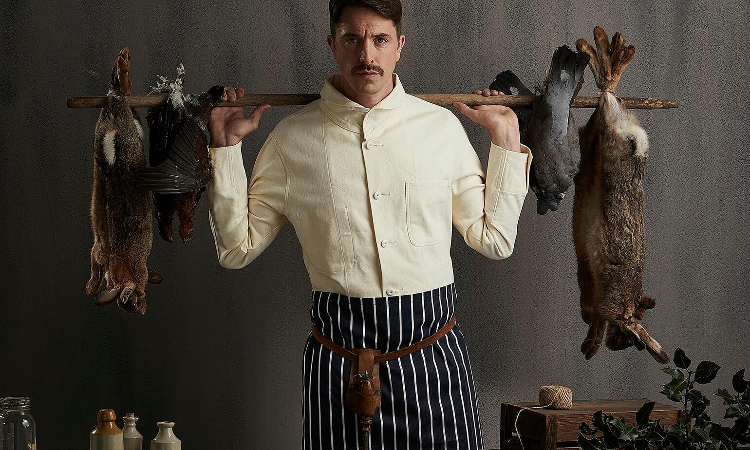 butchers with variety meats on pole 