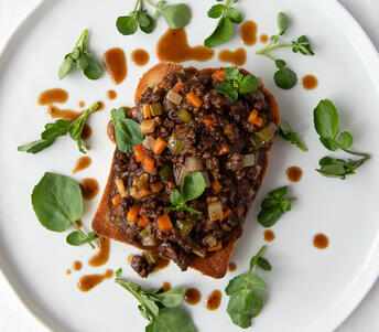 minced beef on dripping toast cooked