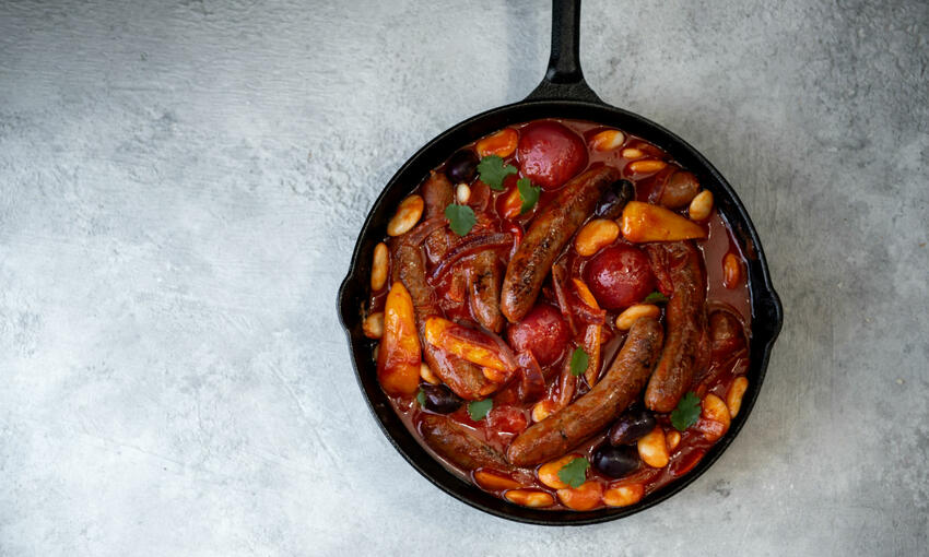 merguez sausage & butterbean stew cooked
