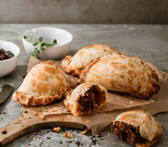 spicy shredded beef & cheddar turnovers cooked