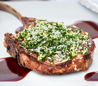 pork rib eye with parsley and lemon cooked 