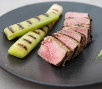 sirloin pave steak cooked with leek