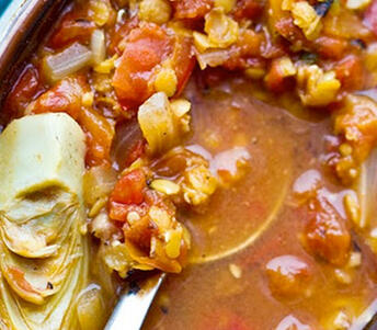 pheasant casserole cooked with artichoke lentil and hazelnuts