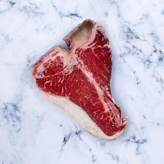 t bone steak on marble background